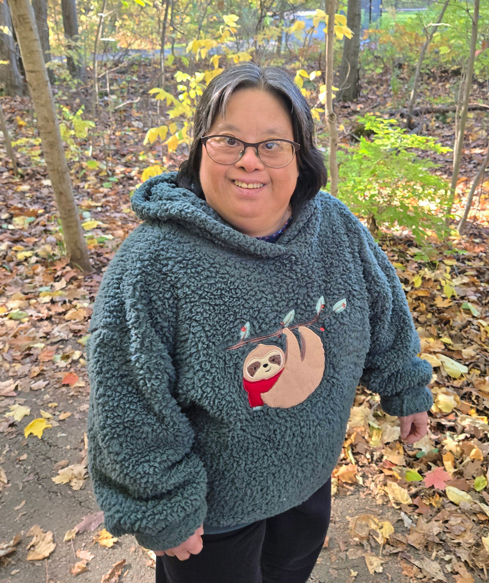 Woman standing in forest
