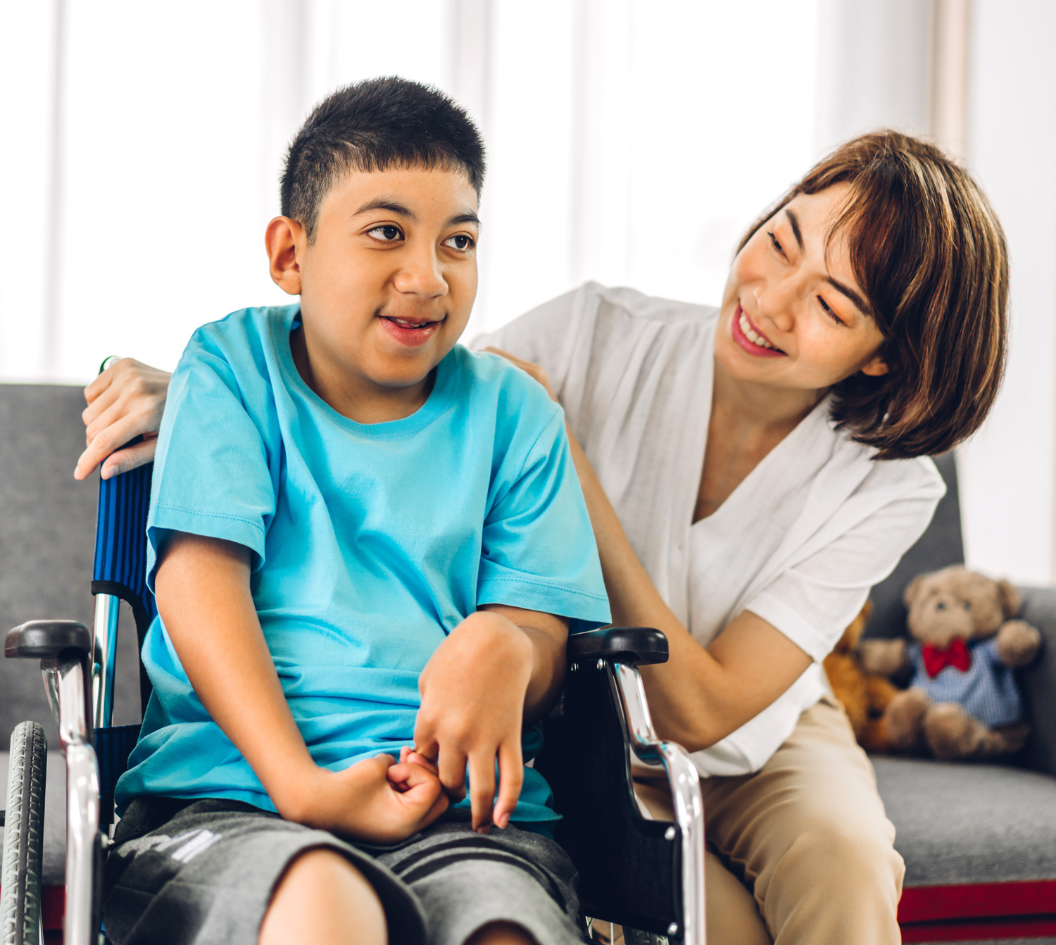 Children’s Supported Living - young man in wheelchair with support worker